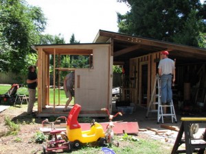 My daddy hard at work on the shed - breaking down the old and building a new one.